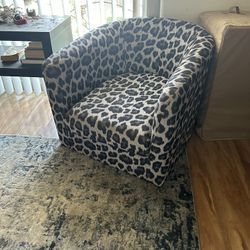 Stylish leopard print armchair in excellent condition. 
