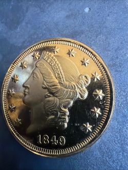 1849 liberty head $20 replica or copy in near mid condition