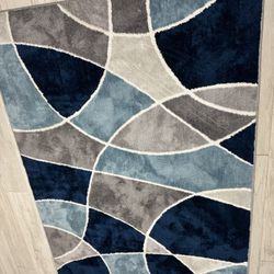 Area rug 83’ long 60 wide 