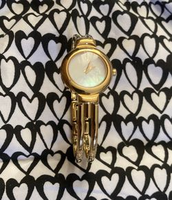 MOVADO MOTHER OF PEARL GOLD WATCH