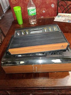 Atari 2600 I think 4 of the round controllers @1 joystick  no power cord