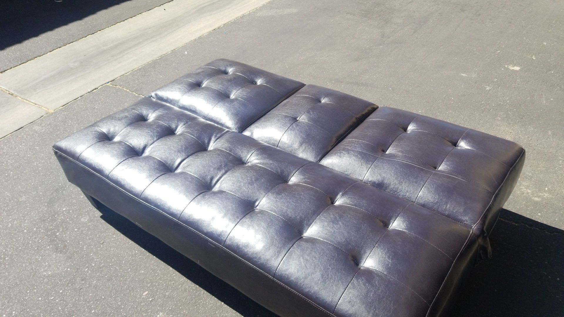 Brown leather futon