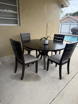Dining Table & 4 Chairs – $198