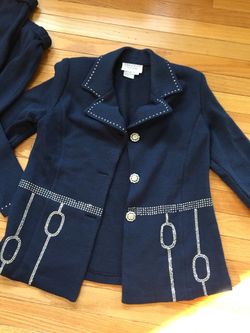 Woman’s suit size 14