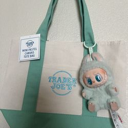 Green Mini Trader Joe’s tote with matching labubu