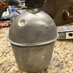 U.S. Military canteen is a genuine item from World War II, specifically dated 1945.  
