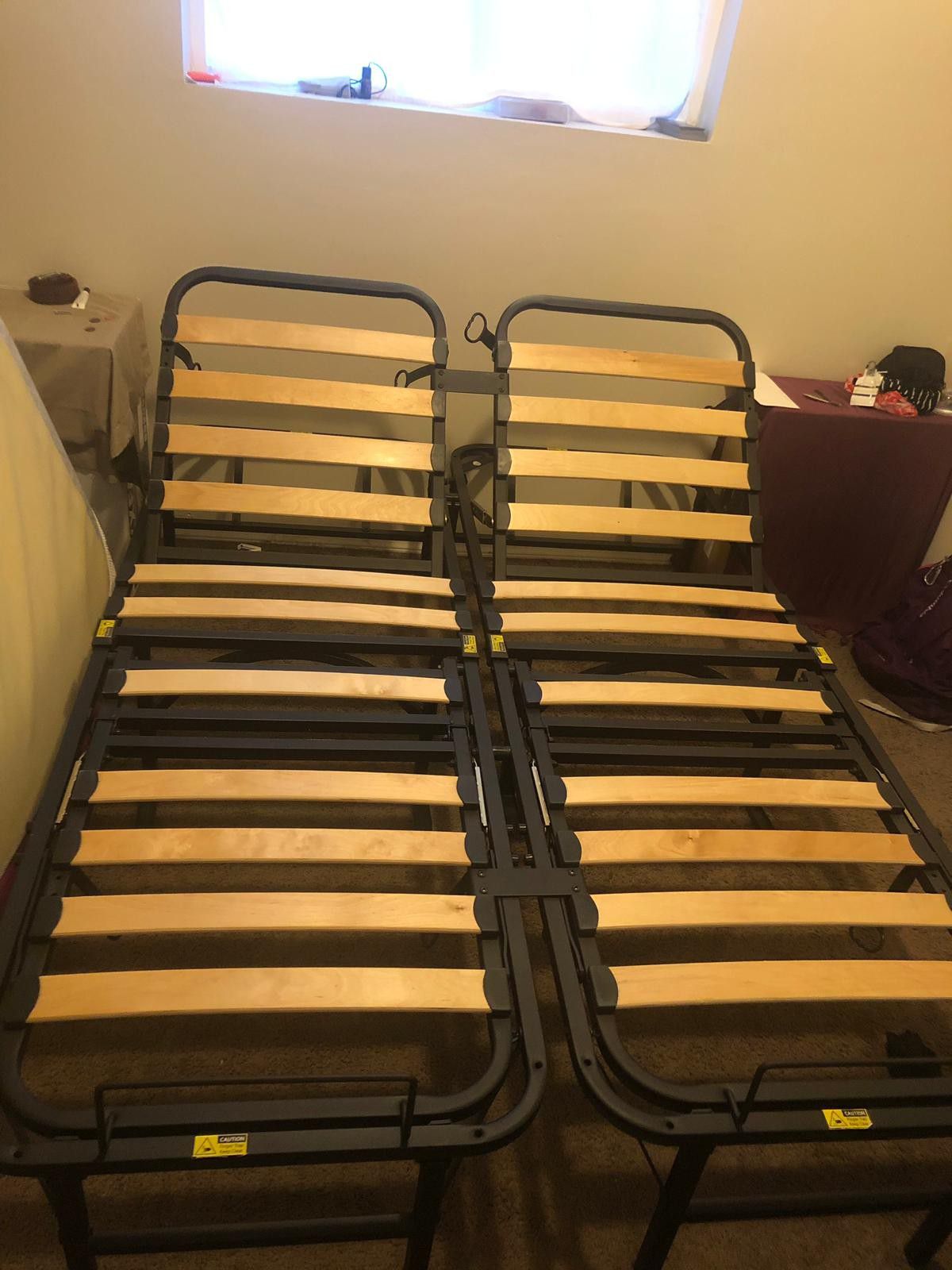 Adjustable (Head and foot) steel bed frame with wood slats- Like new