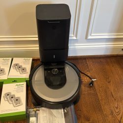 iRobot Roomba Vacuum + Extra Filters/Brushes (2 Boxes) – Fully Working