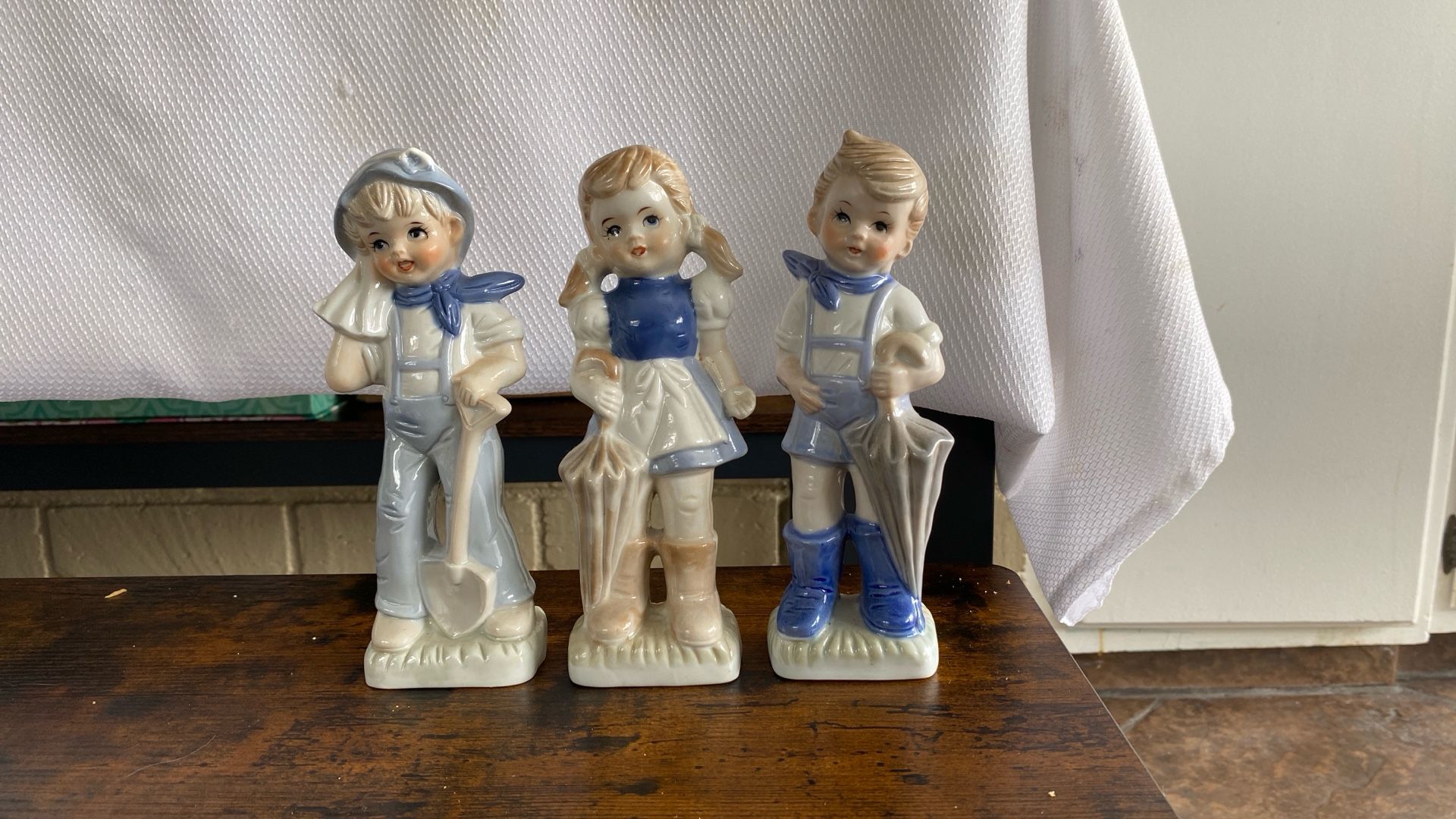 Three cute figurines, 8 inches high. Please let me know if you have any questions. There’s no chip chips or cracks in them.