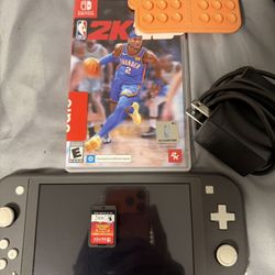 Dark Gray Nintendo Switch Lite (Great Condition) W/ Games And Online Play.