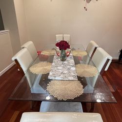 A Modern Big Grand Glass Dining Table With Chairs