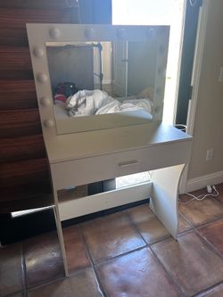White vanity with lights