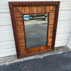 Beautifully crafted wooden frame mirror.  Wicker  frame mirror solid wood back… beveled mirror 39 “ x 50 “ $295