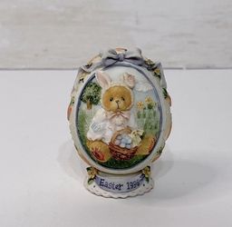 Vintage Cherished Teddies Dated 1996 Easter Egg Bear Dressed as a Bunny with Easter Basket filled with Eggs with Carrots on the back of the Egg. In Ex