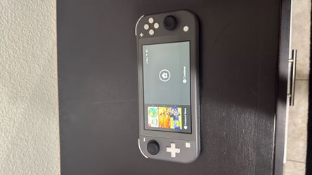 Grey Nintendo Switch Lite (I ACCEPT TRADES)