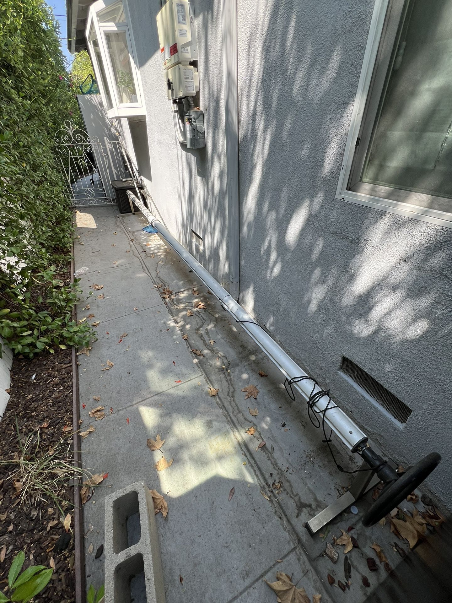 Swimming pool cover roller