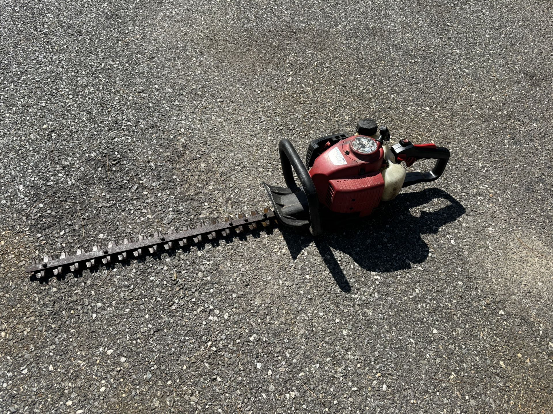 Redmax CHTZ2400L hedge trimmer, in working condition.