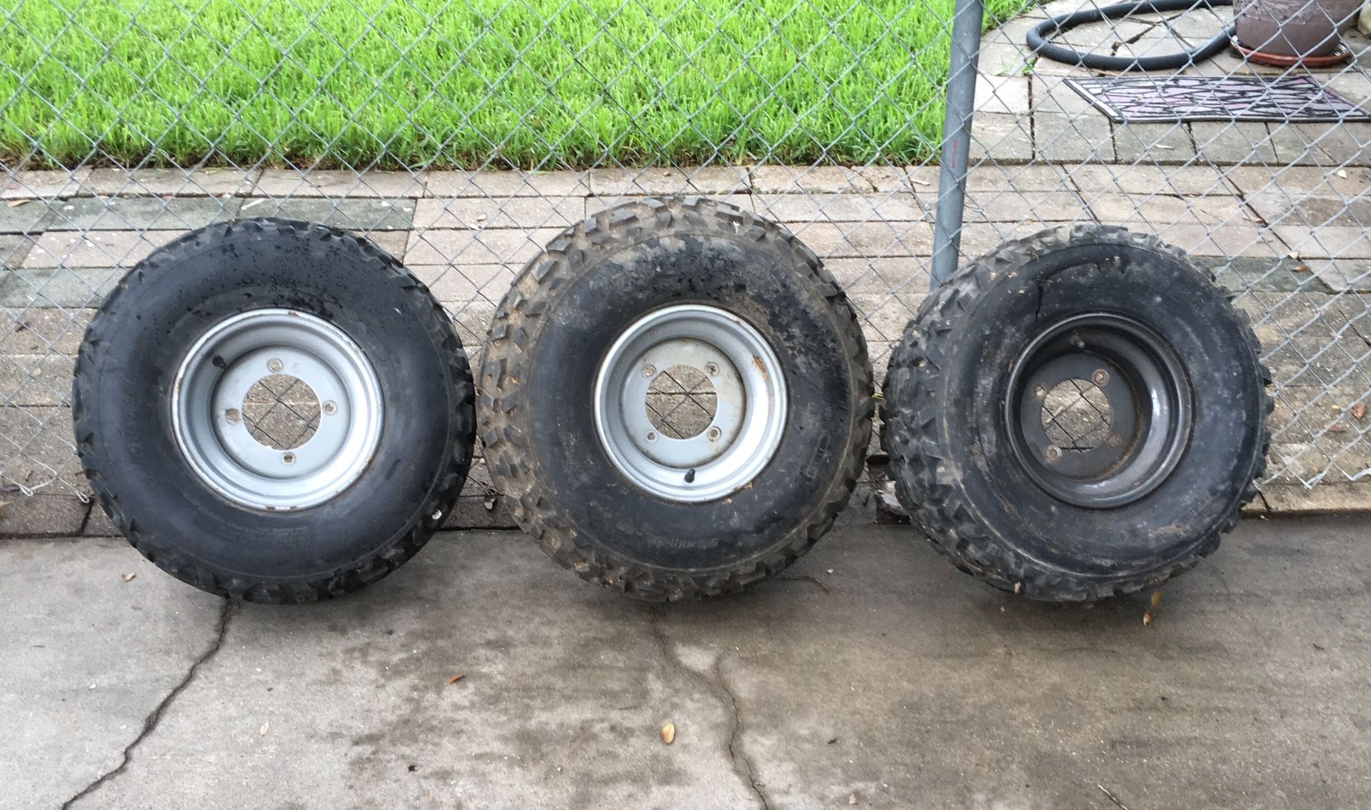 Dunlop 23X11.00-10 ATV tires with rims, $75 for all. Great tread!