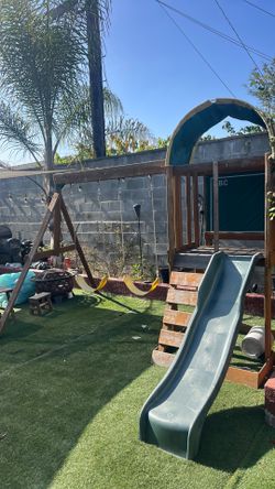 Swing set with slide