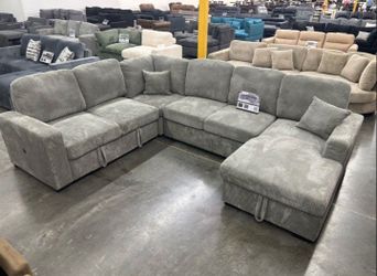 XL sectional sofa with pull-out bed & double storage