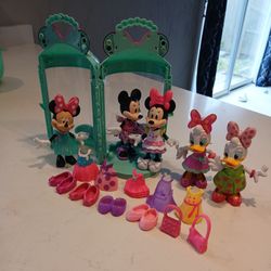 Minnie mousse and daisy  dolls and cloths