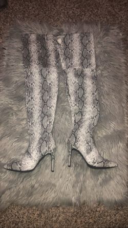 High tight snake print boots