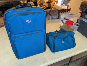 American Tourister Carry On which Duffle