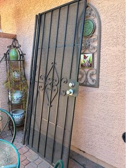Black metal security door .