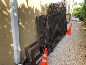 Electric gate noisy or moving uneven? Chain, motor, sensors, and full gate issues