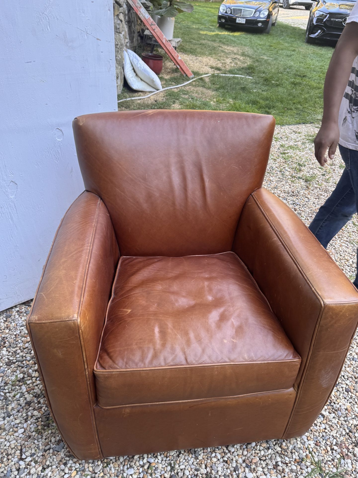 Create and Barrel Leather Chair On Swivel