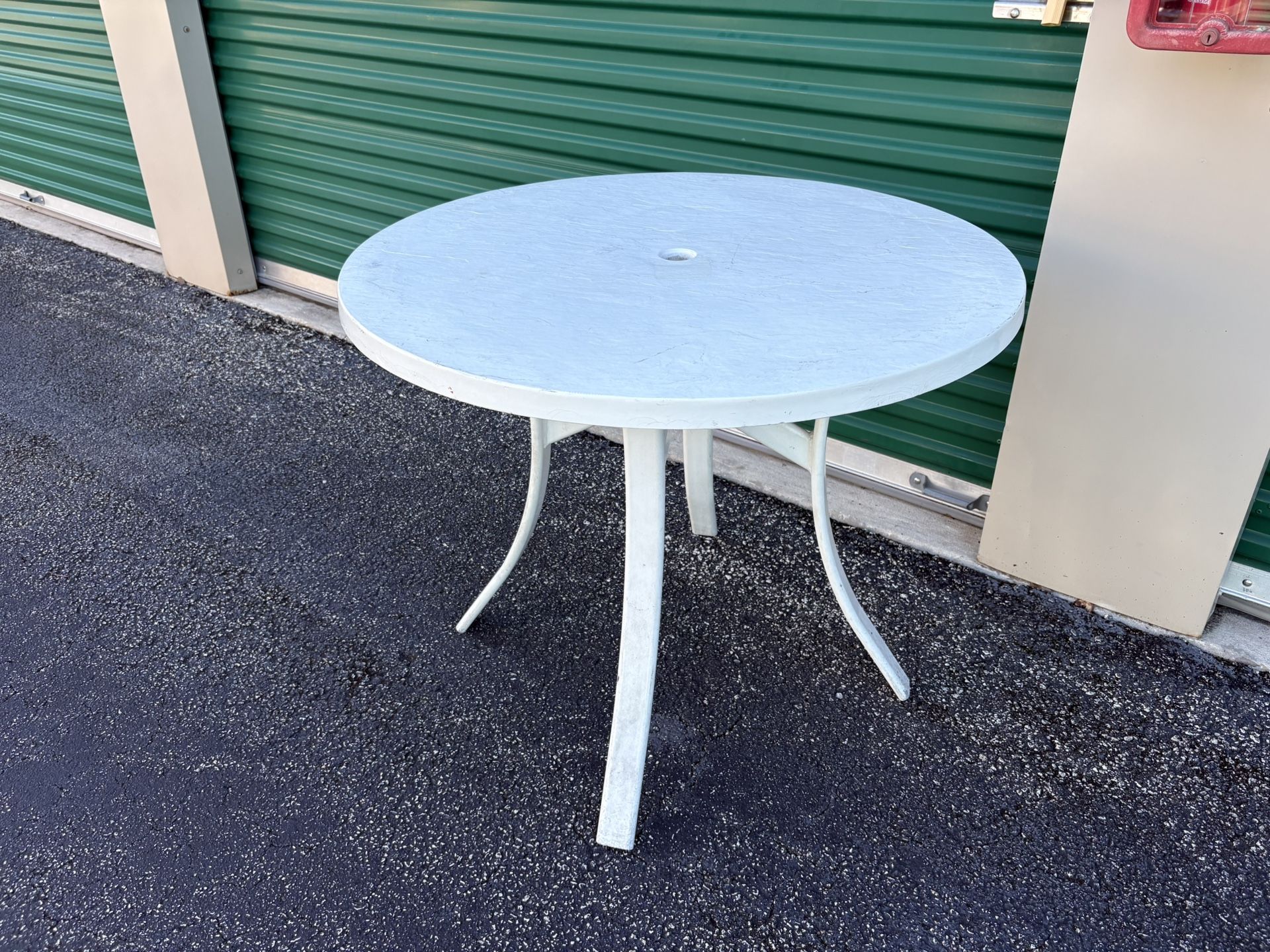 $25 for (1) White Round Outdoor Patio Table-36W x 29H