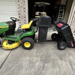 John Deere S100  Riding Mower With 33 Hours, Double Bagger And 10cu Ft Brinly Dump Trailer