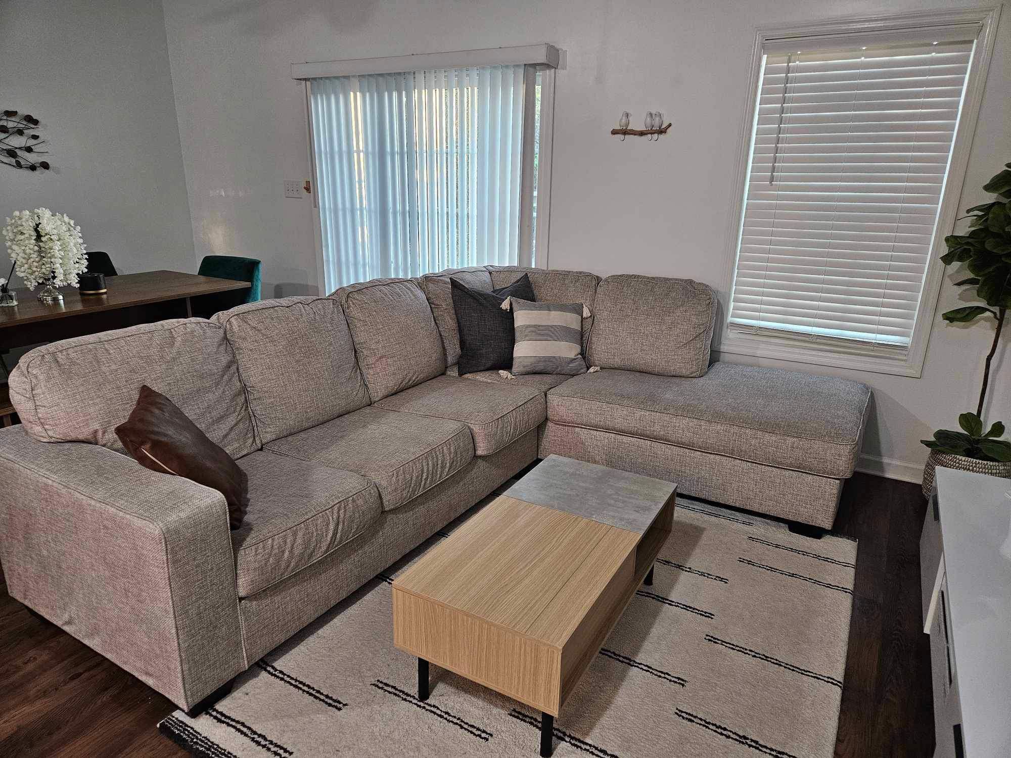 Living Spaces 2 Piece Sectional Couch With Chaise