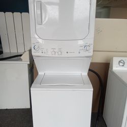 Stackable washing machine and electric dryer with warranty in like new condition 