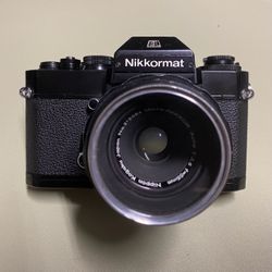Nikon/Nikkormat 35mm film camera.