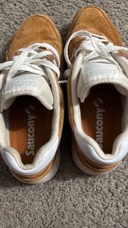Saucony Shadow 6000 in brown/caramel suede with white details.