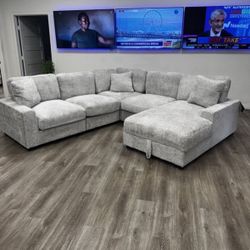 NEW IN  BOX - Grey Sectional With Accent Pillows and STORAGE CHAISE** Finance Available $54 down