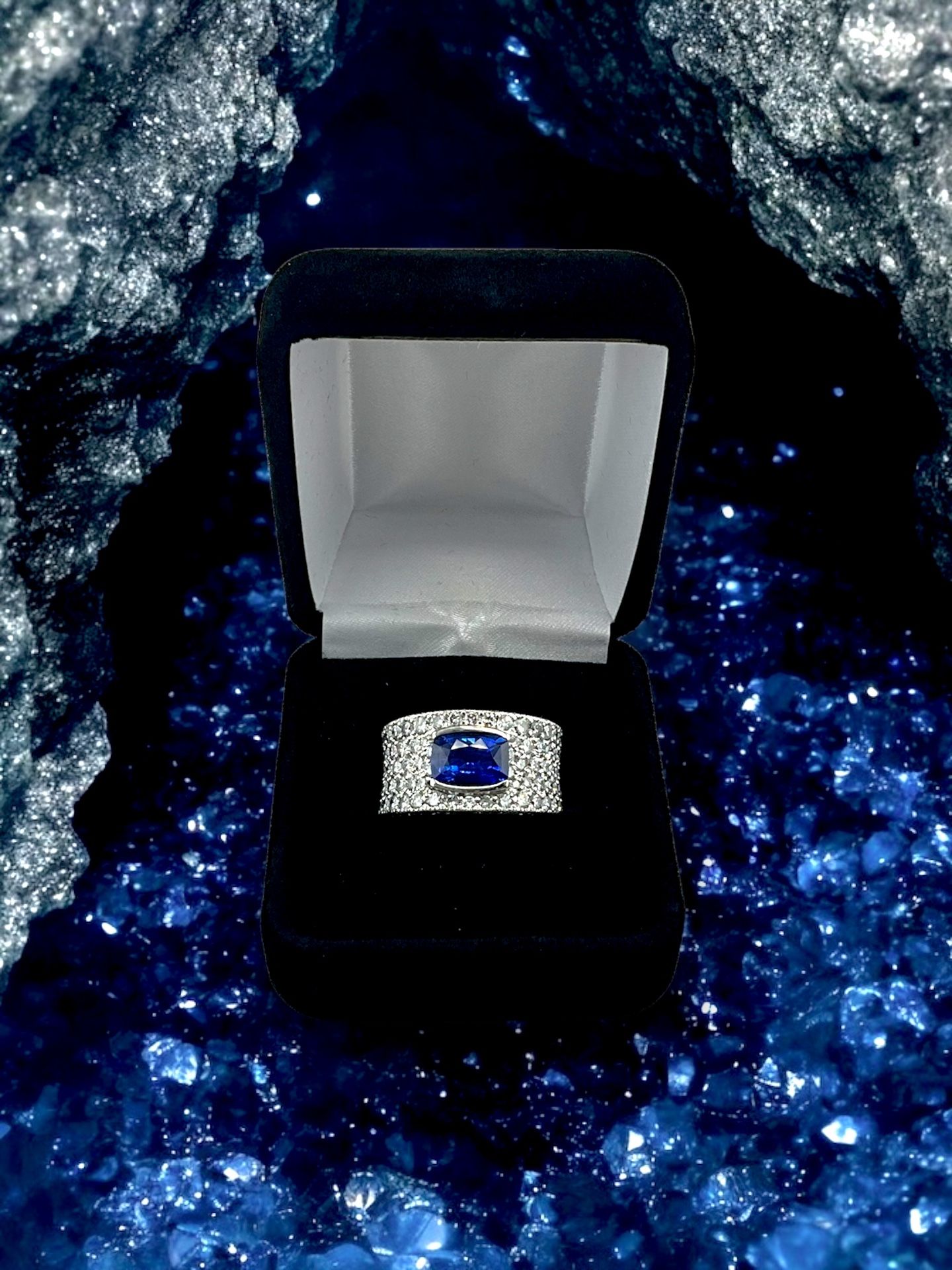 Platinum 17.40g with Cluster Diamonds and Center Rectangular Cushion Blue Stone Ring