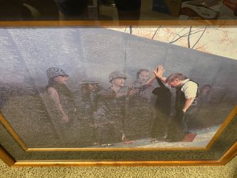 Reflections Vietnam Memorial Framed Lithograph . Beautiful Maple Frame with Glass Front. $160.00 Firm. This is a collectors piece.
