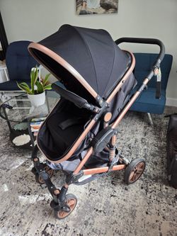 Folding baby stroller with bassinet.