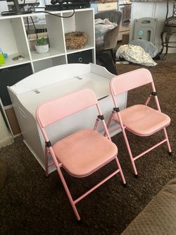 2 pink children chairs
