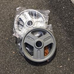 2-25lbs Olympic Style 2inches Weight Plates.  BRAND NEW
