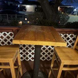 Bar height table and chairs