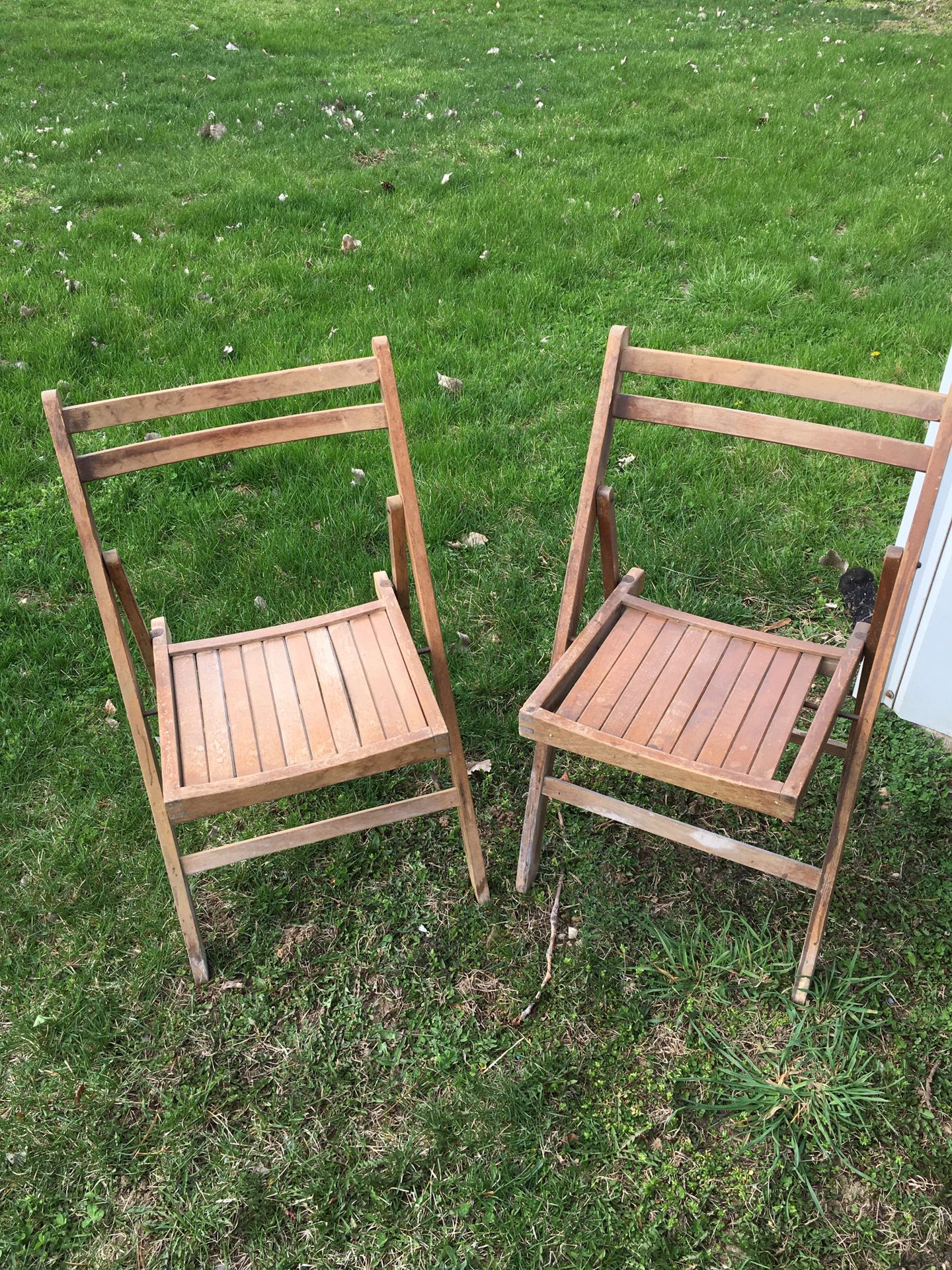 Two solid wood folding chairs $30