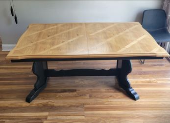 Solid wood dining table with leaves