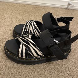 White and Black Doc Martins scandals