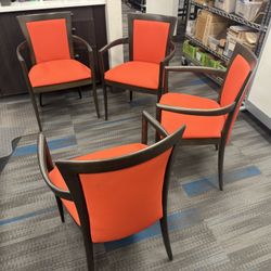 Four Wood Arm Chairs