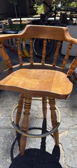 Solid wood bar stools and live edge bar.