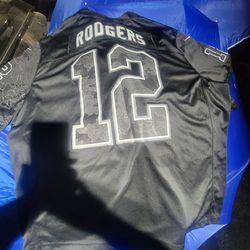 Men's Green Bay Packers Aaron Rodgers Nike Black RFLCTV Limited Jersey.