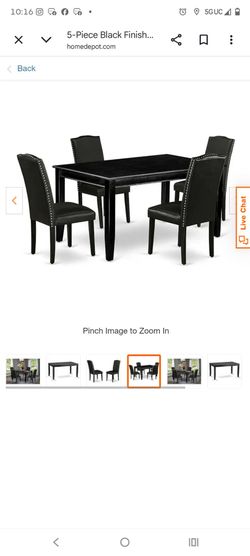 Black dining room set with four chairs